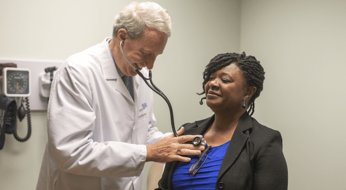 Dr. Mumper with patient