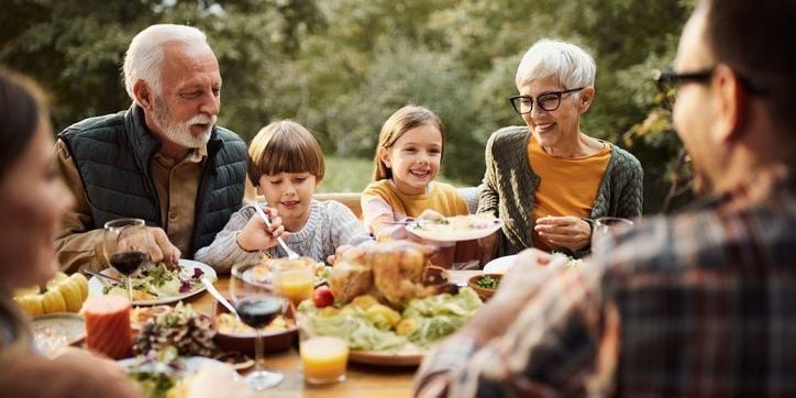 Family enjoying a fall meal