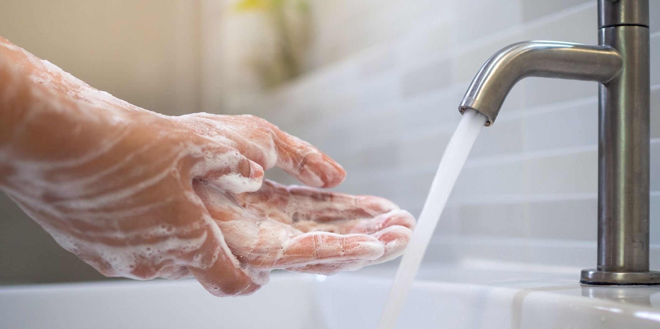 Someone washing their hands