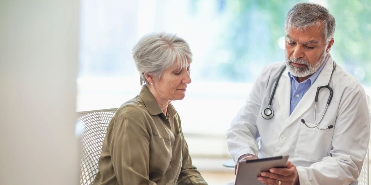 Doctor talking to patient