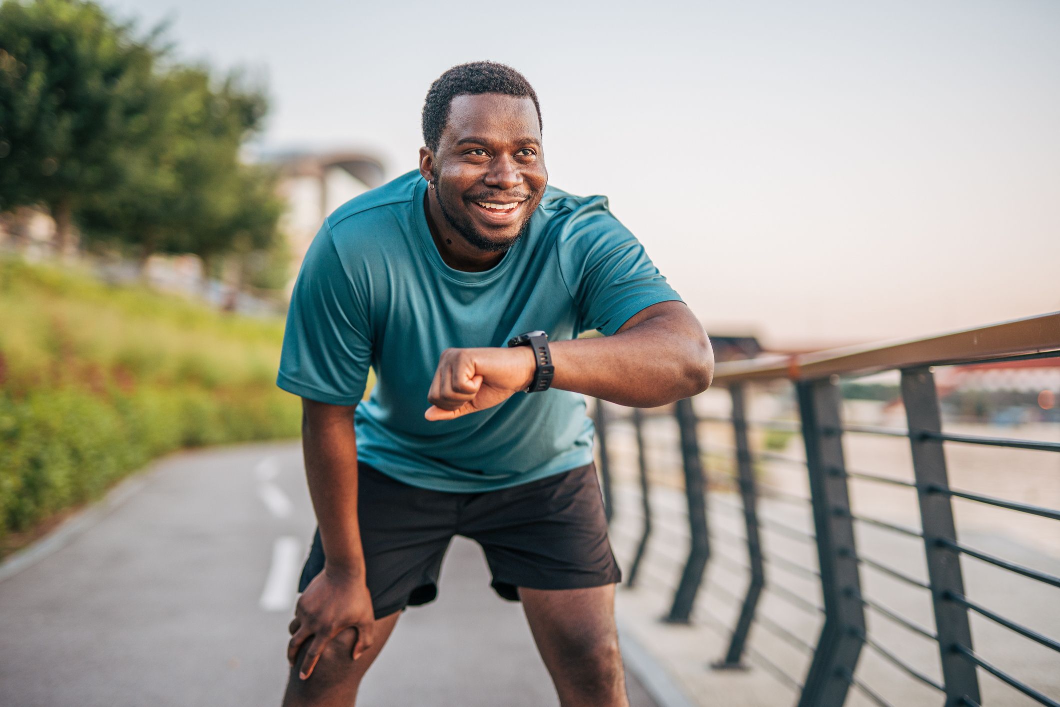 Man running with fitness watch.