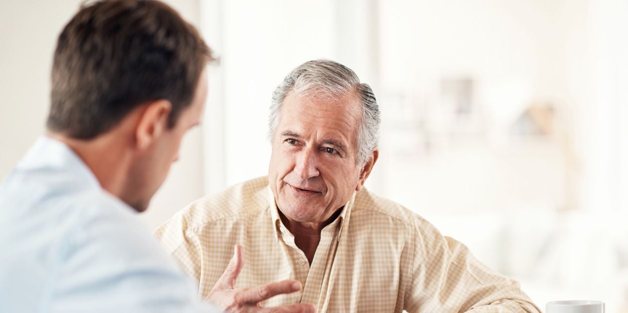 Executive talking to doctor