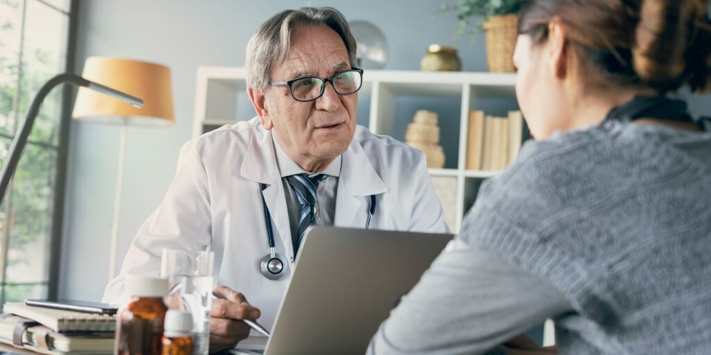 doctor discussing health options with patient