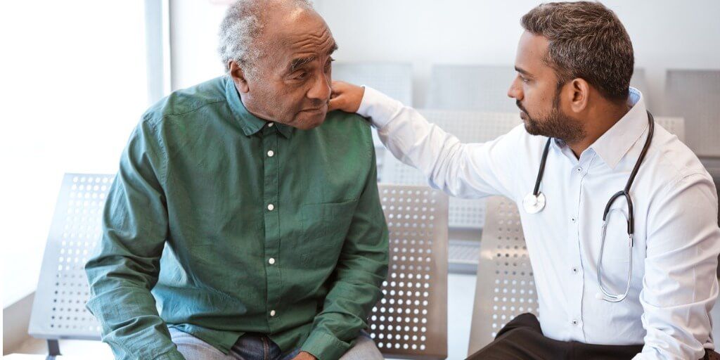 elderly male patient seeing doctor