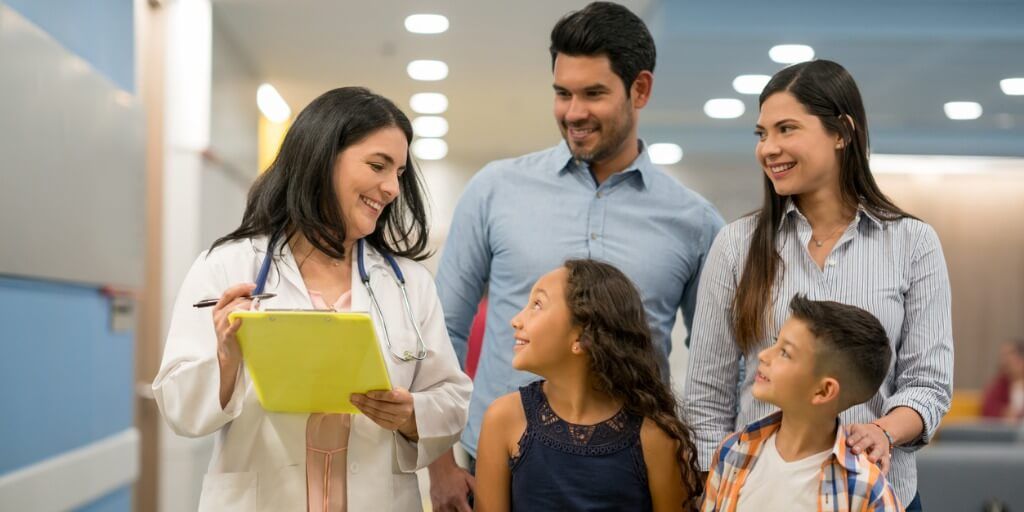 Female concierge physician with an entire family. 