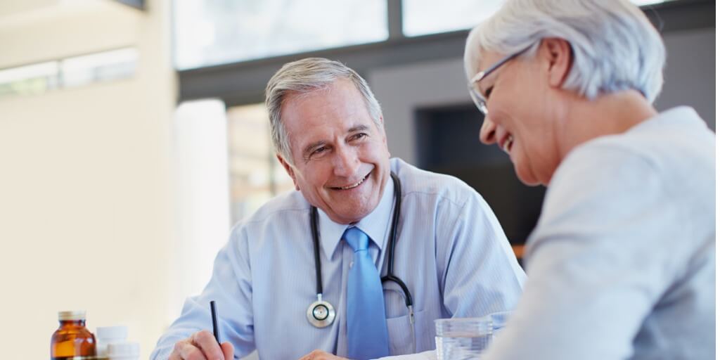 male concierge doctor speaking with patient