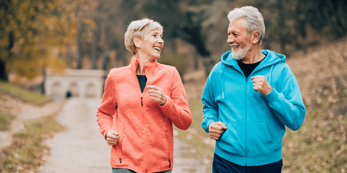 Senior couple running
