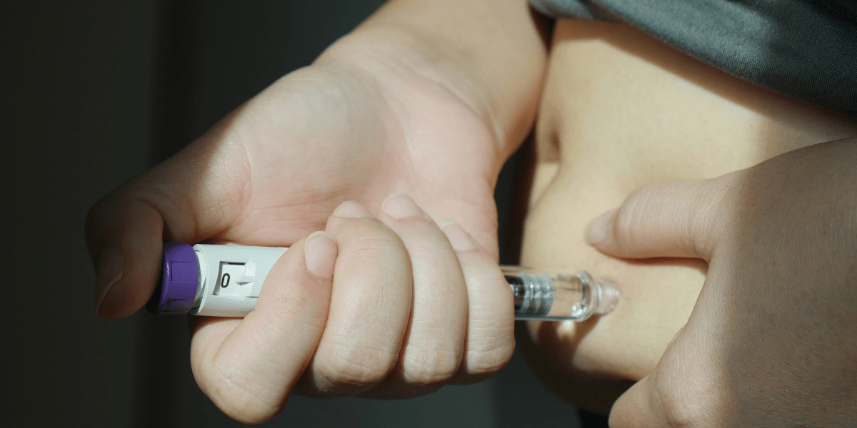 Person taking GLP-1 injectable