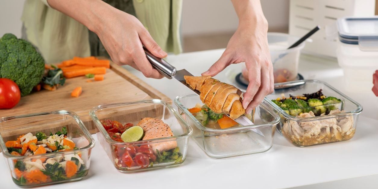 Woman preparing protein-filled meals.