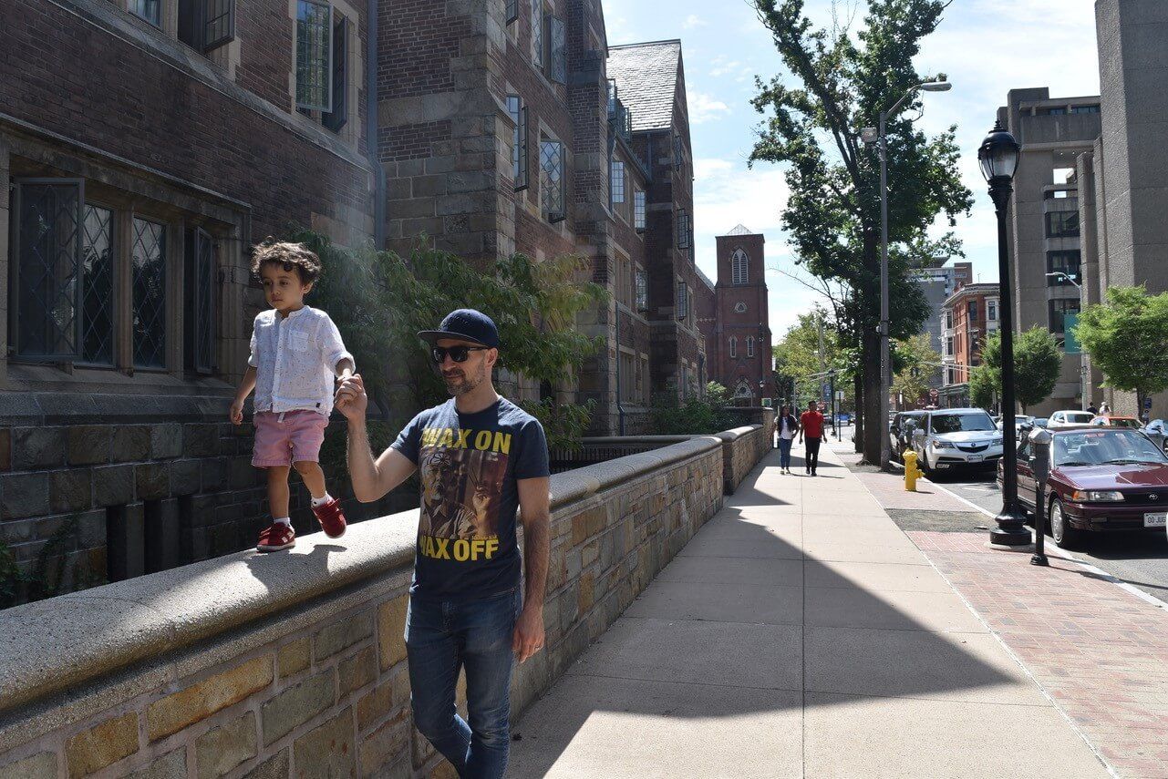 Dr. Carreño walking with his son