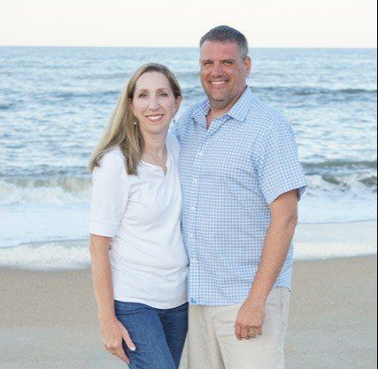 Dr. Kladder with her husband on the beach
