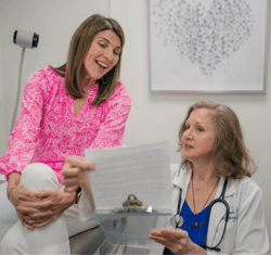 Dr. Morse, a concierge physician, speaks with a patient.