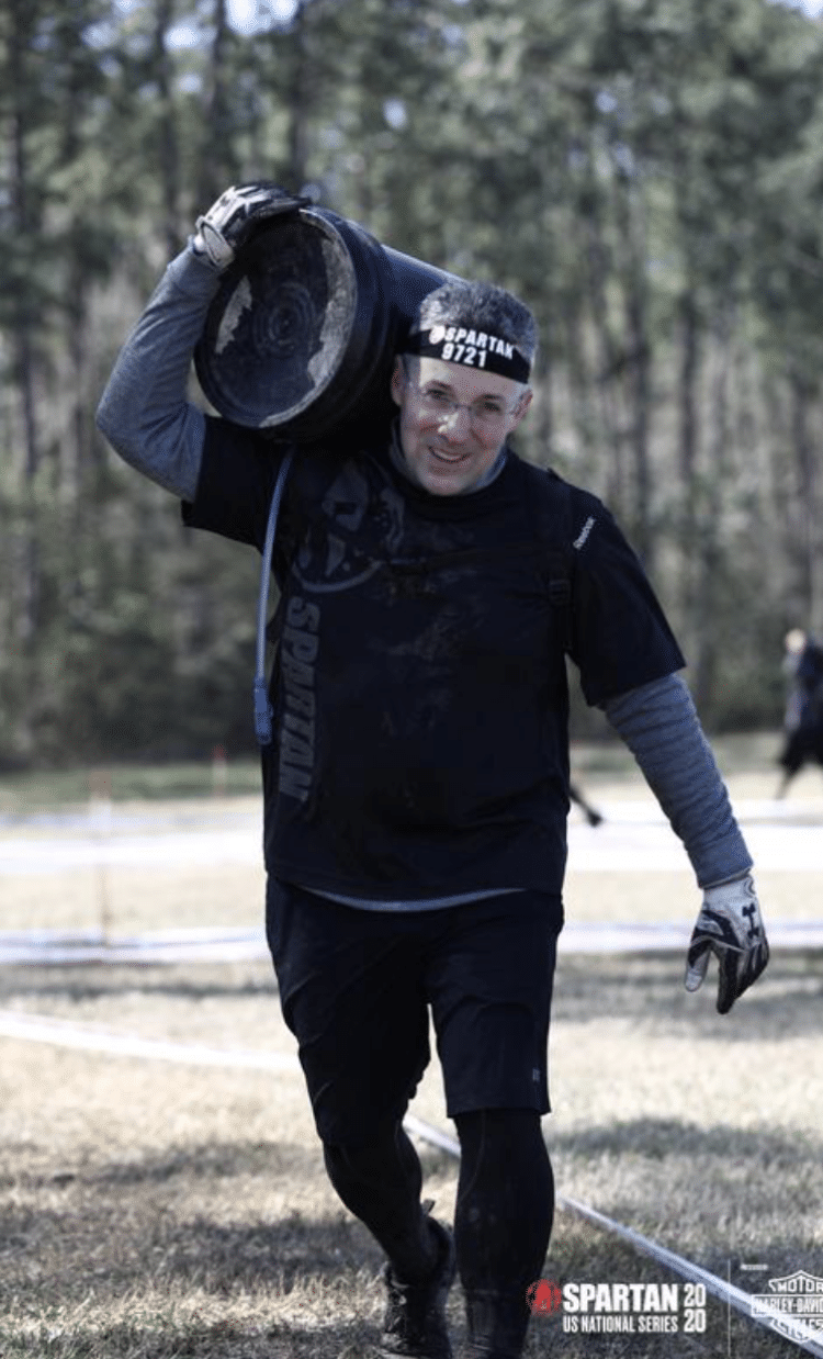 Dr. Norris competing in a spartan race