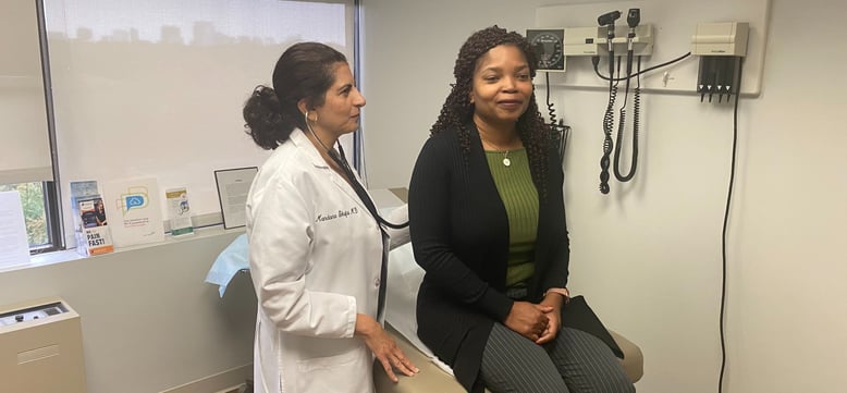 Dr. Mandana Shafai, a holistic primary care doctor at PartnerMD McLean, with a patient