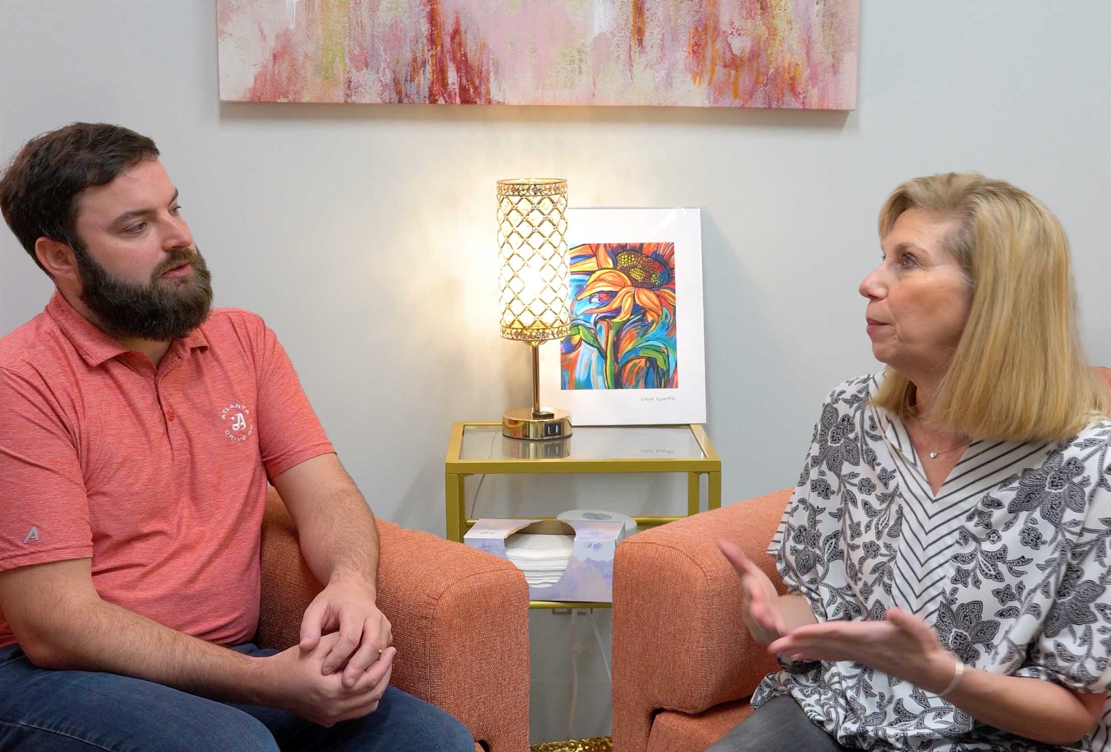 Erin Goldin, LCSW, talking with patient in her office