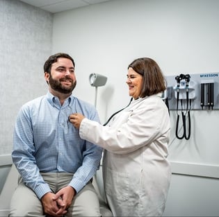 Dr. Gladfelter with a patient