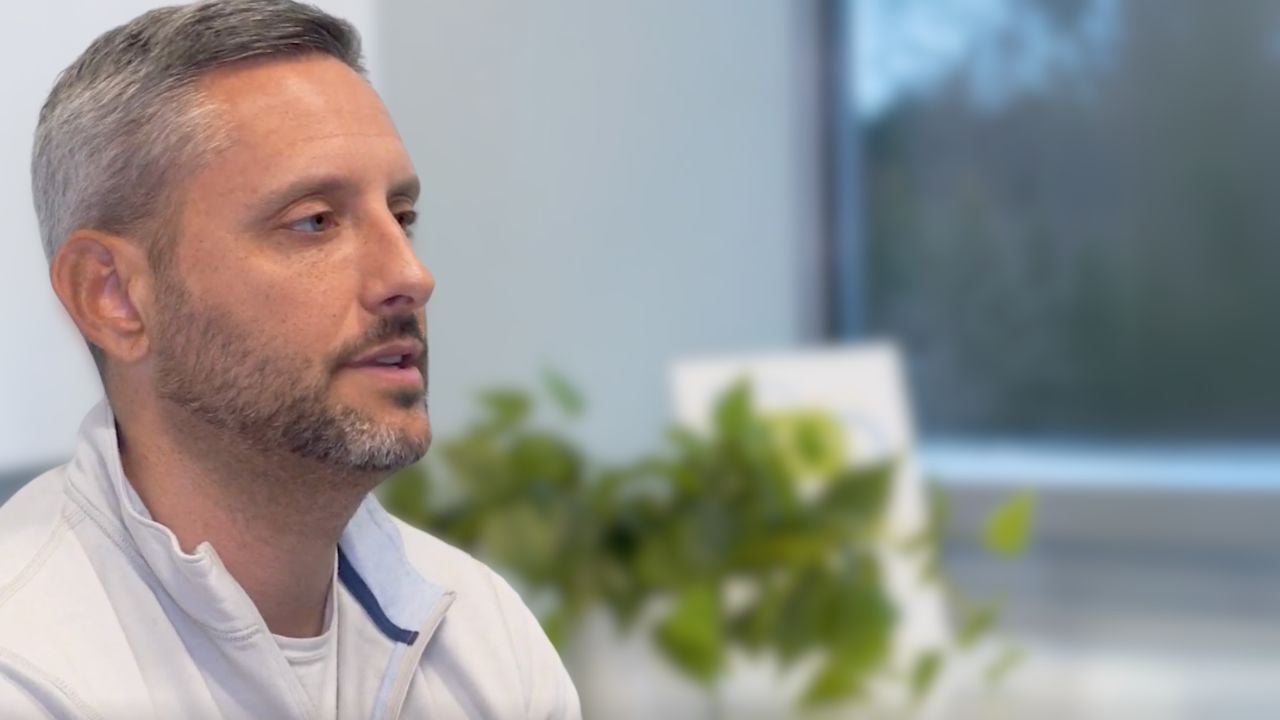 A photo of Jonathan McNamara as he gives his patient testimonial for PartnerMD