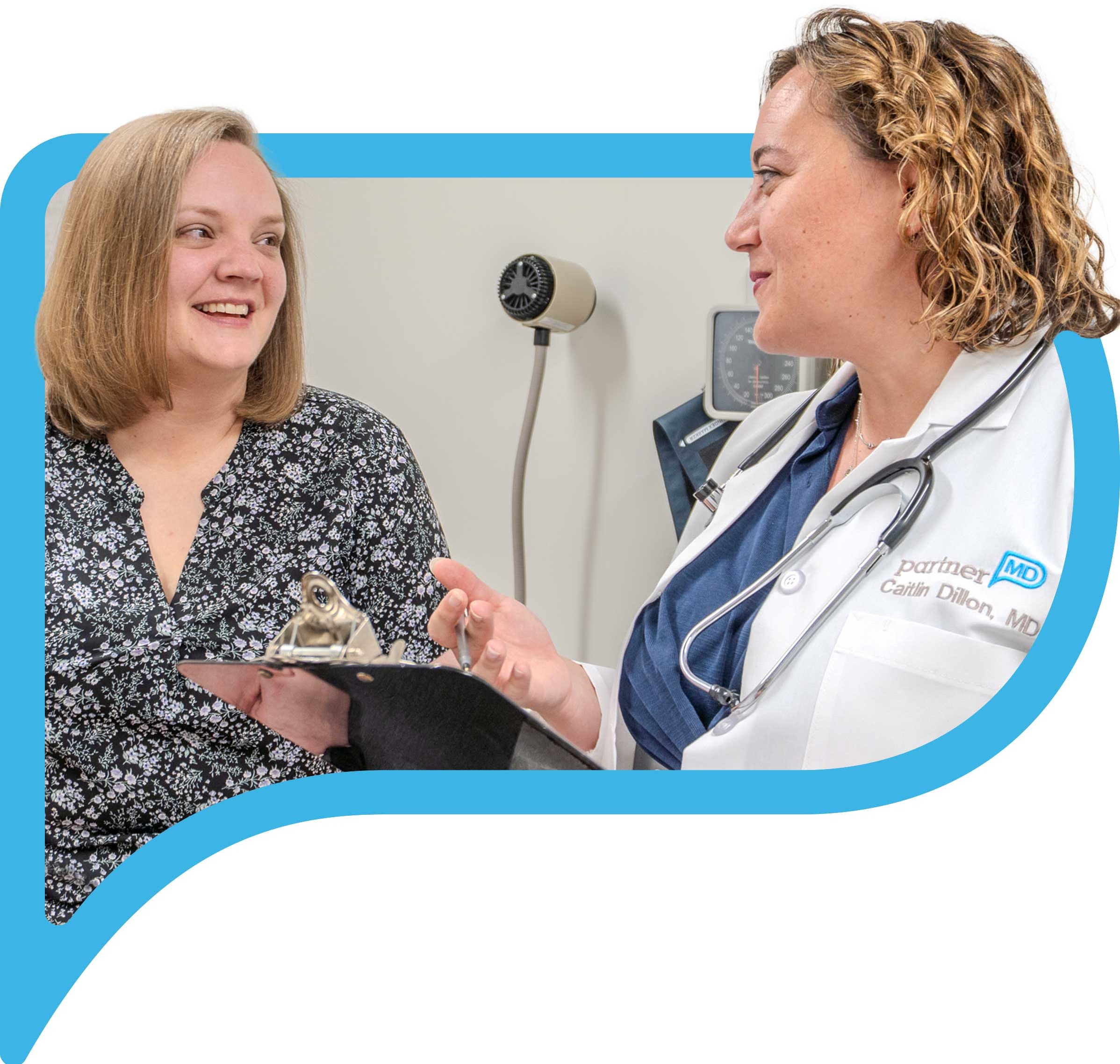 Image of Dr. Caitlin Dillon talking with patient