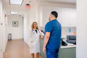 Dr. Kitay talks with a nurse in PartnerMD's McLean office