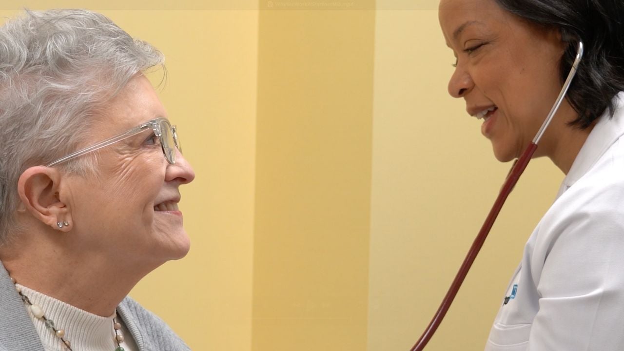 A photo of Doctor Tutt from Sandy Springs smiling at a patient.