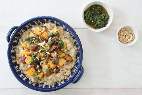 Purple Carrot's Roasted root veggies over creamy couscous with herb sauce.