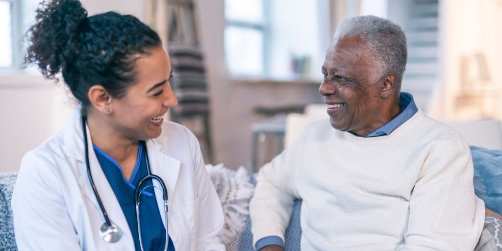 Physician and patient laughing