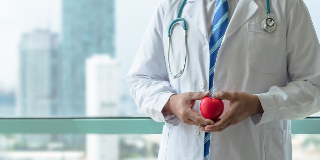 Physician in a white coat.