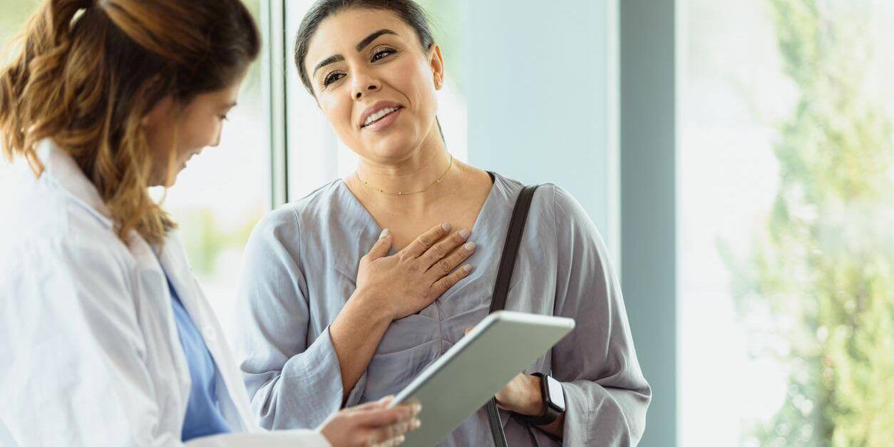 A woman talking to a doctor 