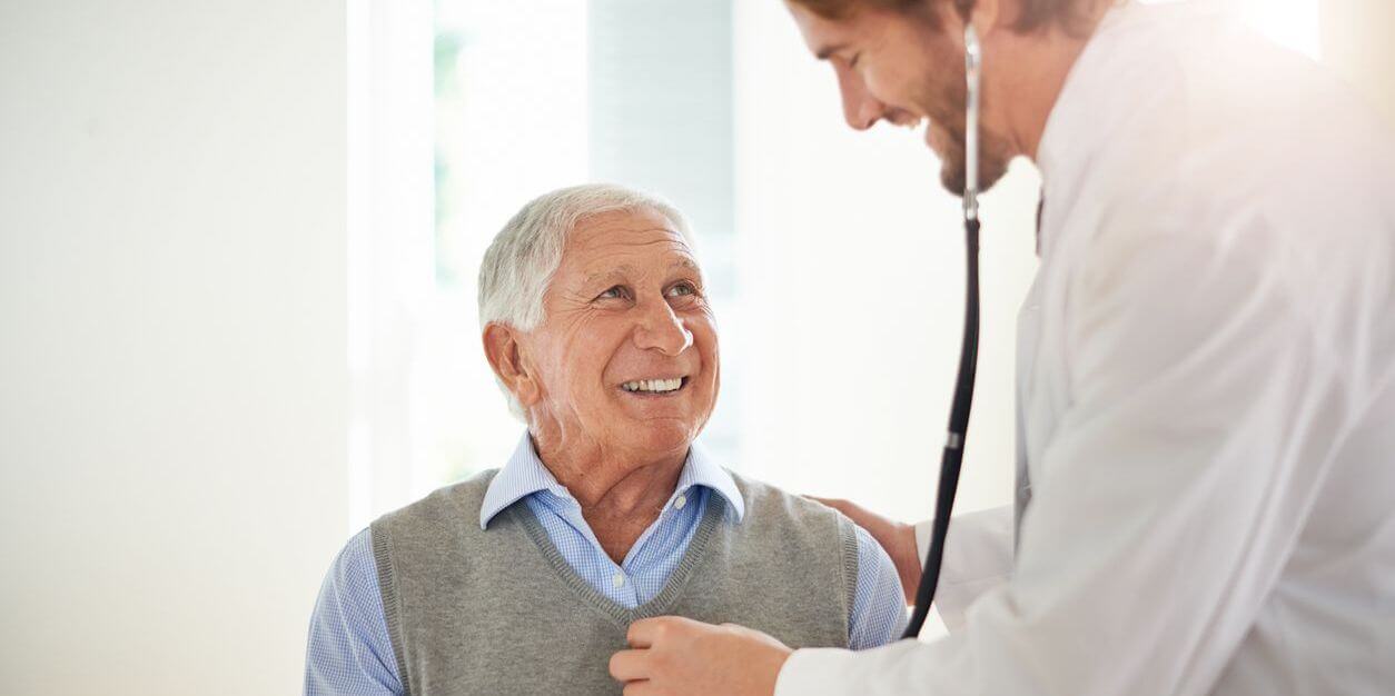 Doctor listening to a patient's heart