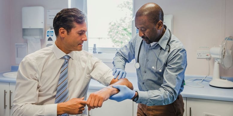 Professional man visiting his doctor