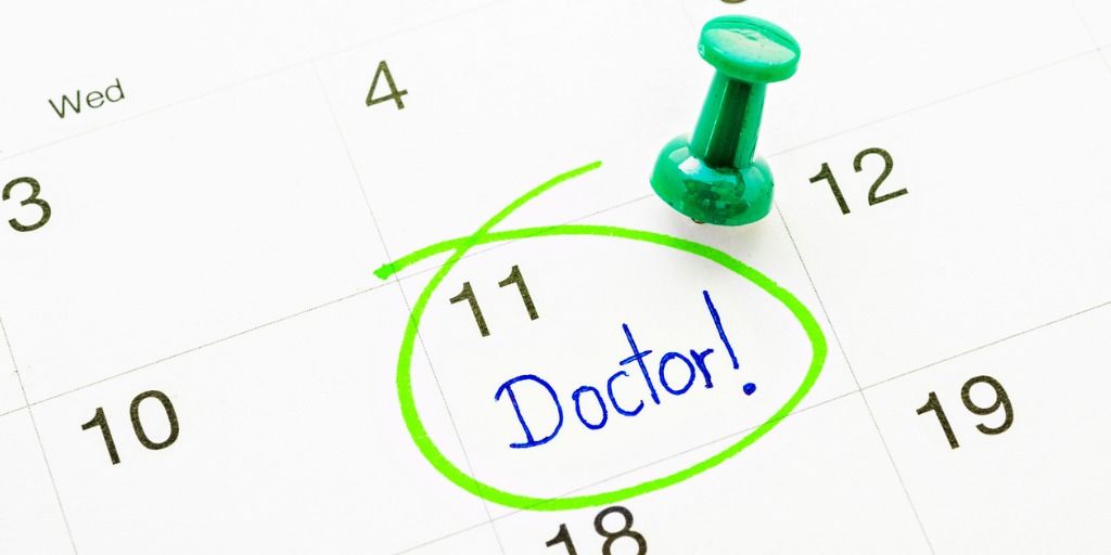 Calendar with doctor circled on the 11th of the month. 