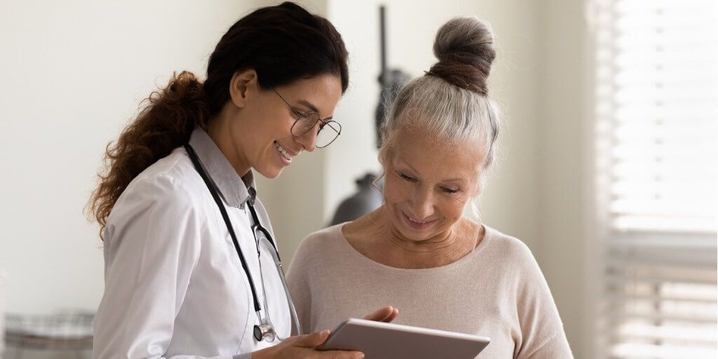 Concierge physician with one of her patients. 