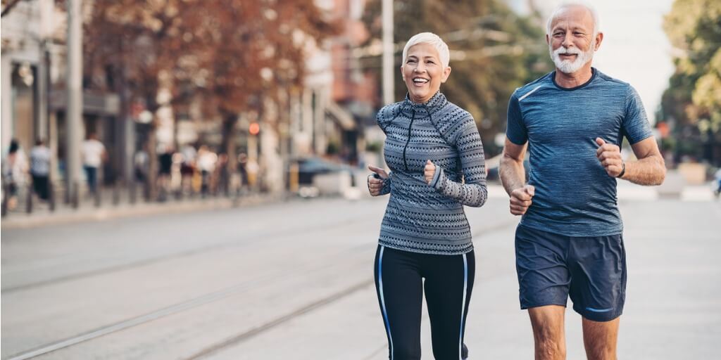 two seniors exercising to prevent disease