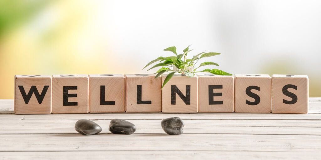 Wellness spelled out in blocks