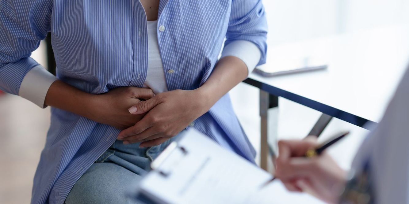 Woman at doctor about gut health