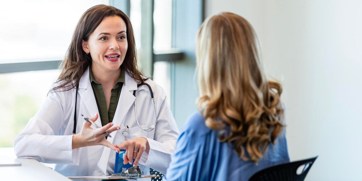 Woman talking to her doctor